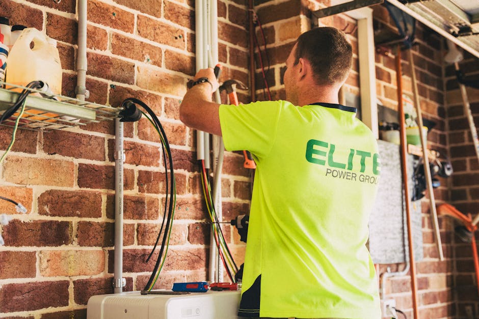 Modern home battery storage unit mounted on a garage wall